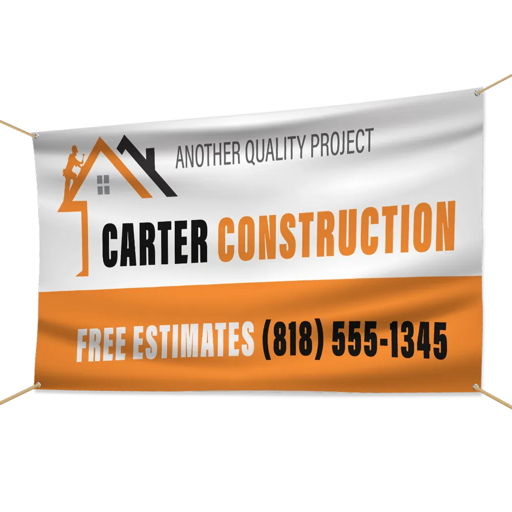 Full-color vinyl banner for a construction company, hung with rope